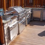stainless steel grill and appliances on outdoor kitchen space