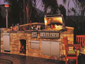 Santa Fe Island style outdoor kitchen island with chairs in front of it