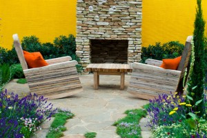 If you dream of having an outdoor fireplace but don't have enough space, opt for a garden fireplace instead.
